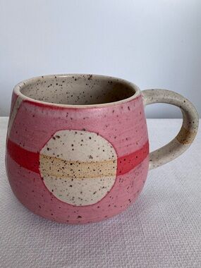 Hand thrown pink pottery mug